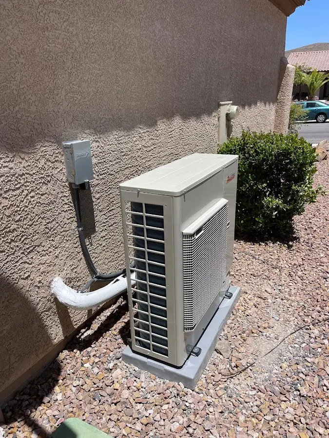 Residential air conditioning condenser unit in Claremont