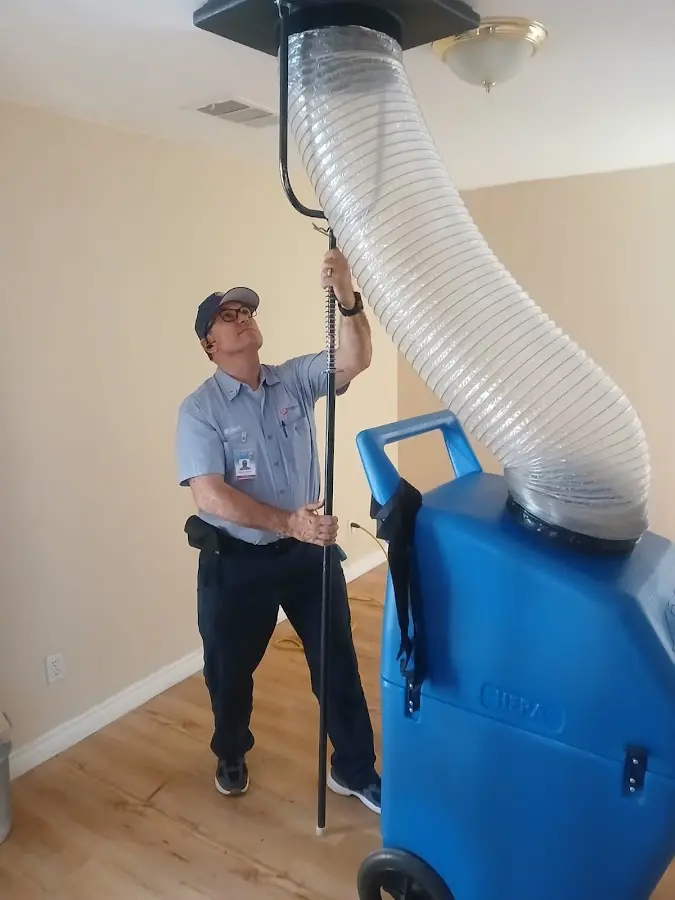 HVAC Installation technician using HEPA equipment in Claremont